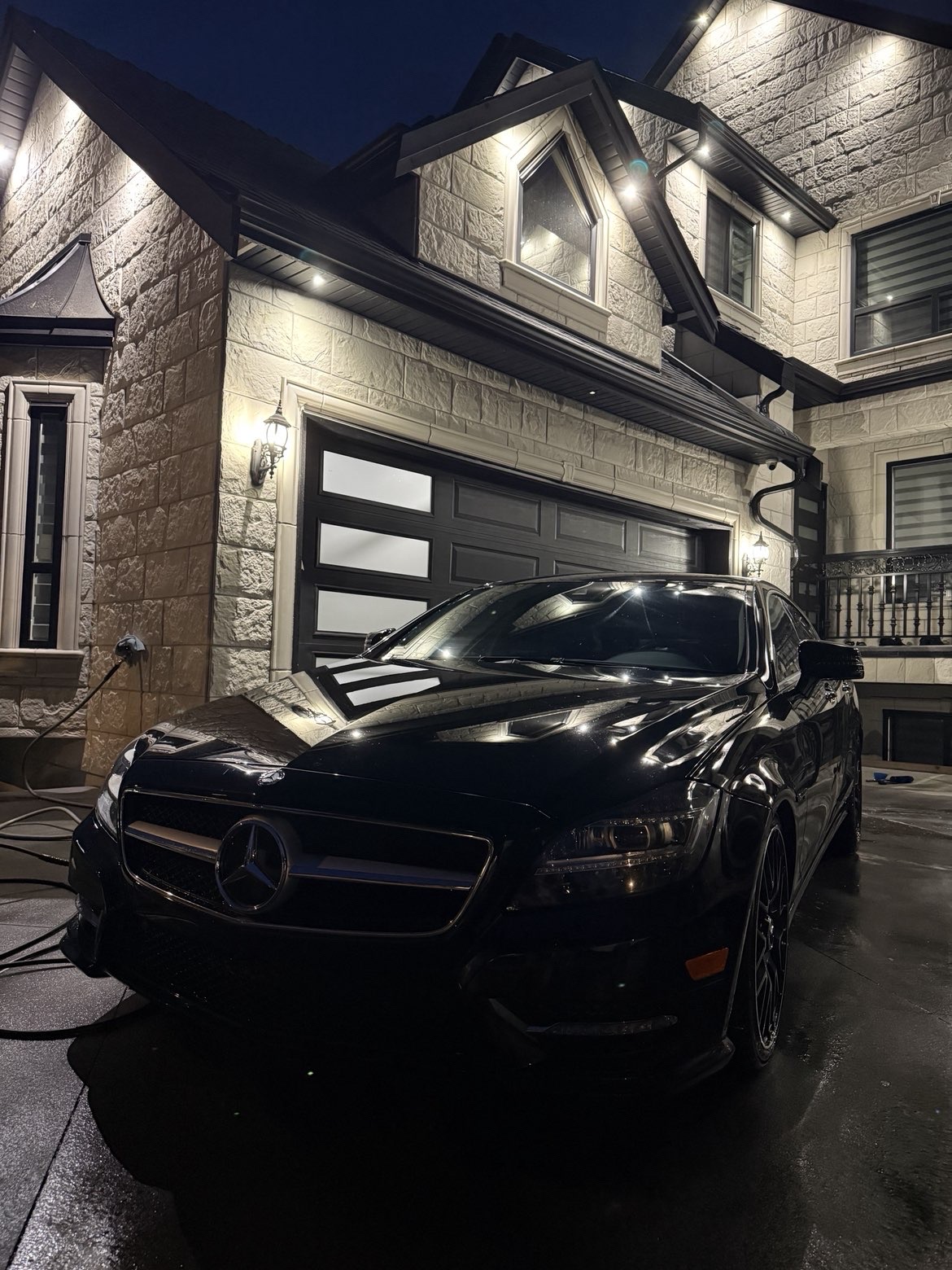 Black Mercedes-Benz CLS detailed at night